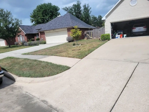 Image of a driveway after pressure washing